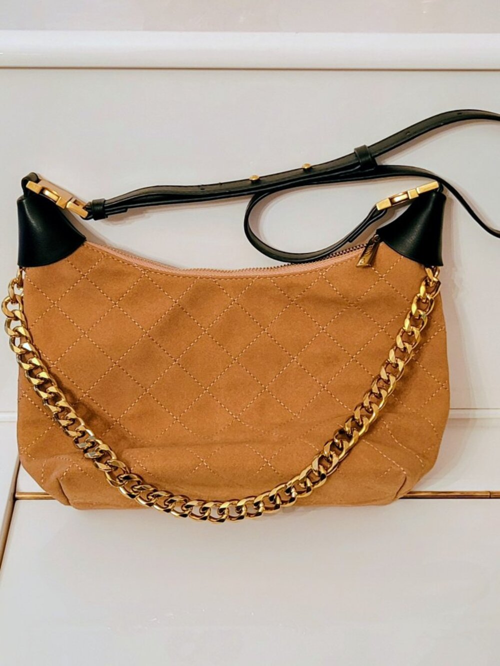 **Light Brown/tan suede fashion shoulder bag w/black trim. No brand.